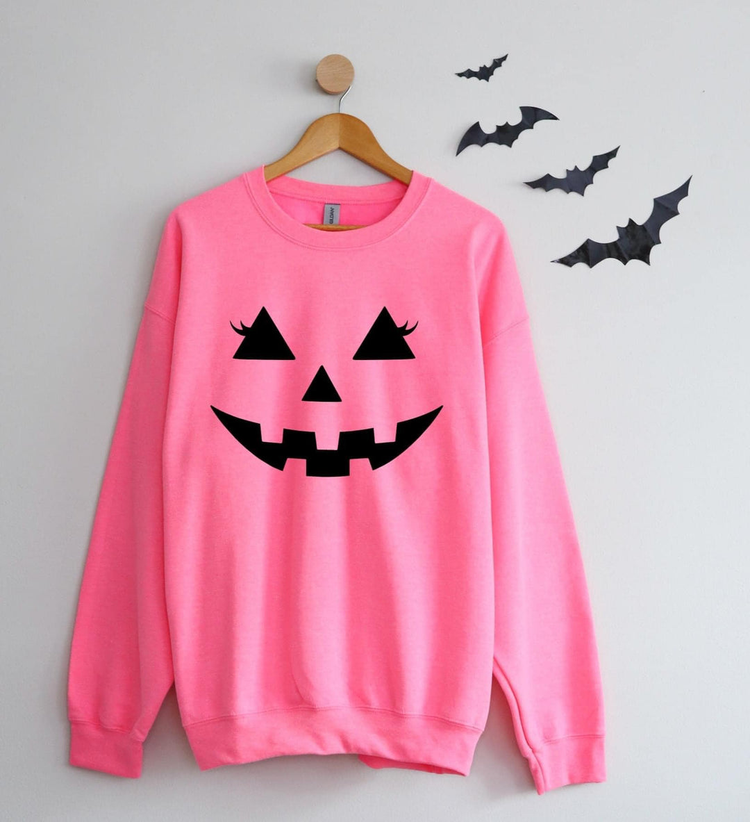 Pink winky face pumpkin sweatshirt