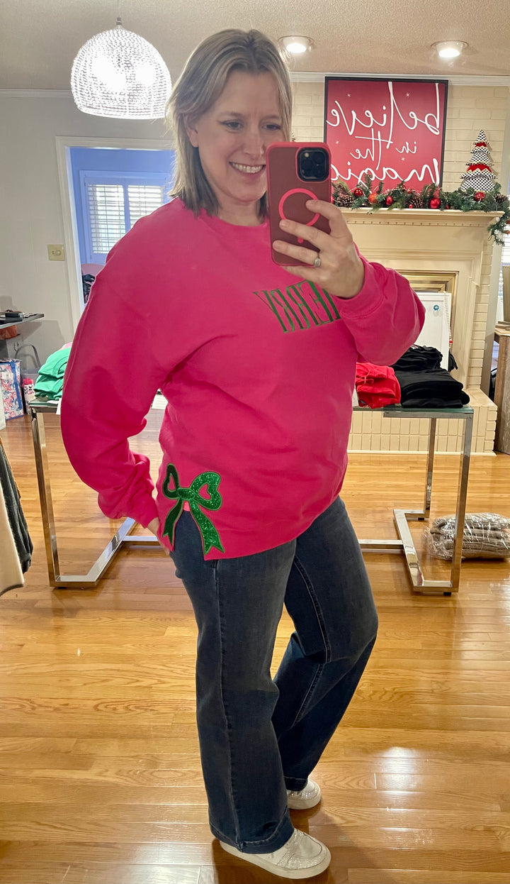 Hot pink sweatshirt with green side bows