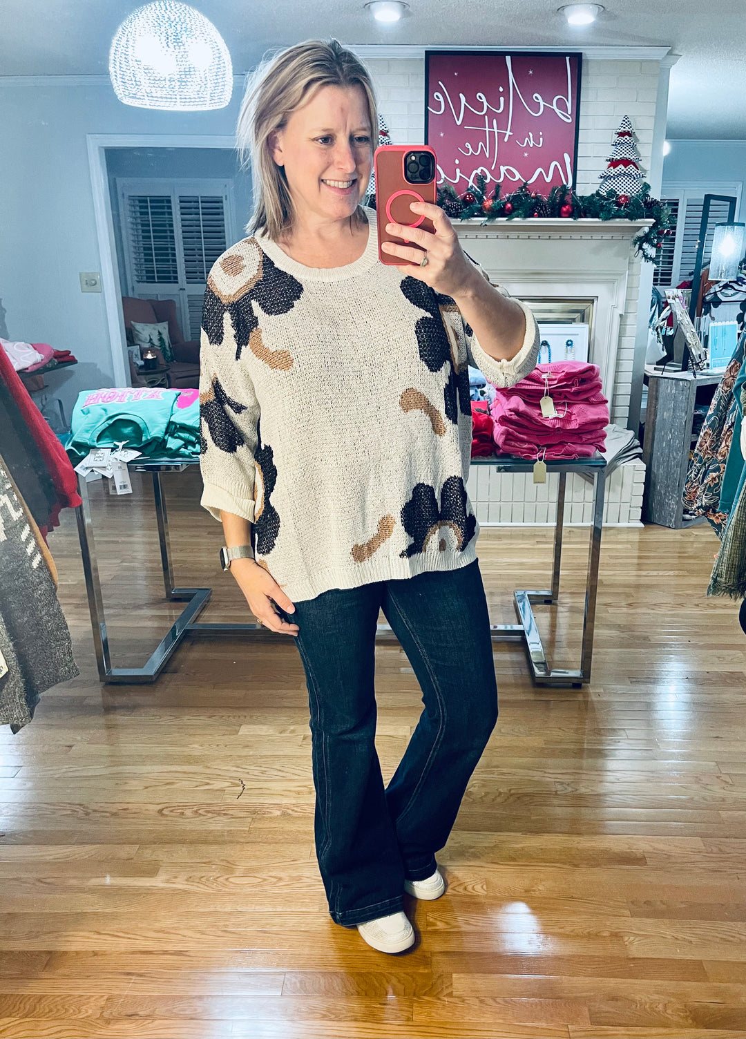 Ivory sweater with dark neutral florals