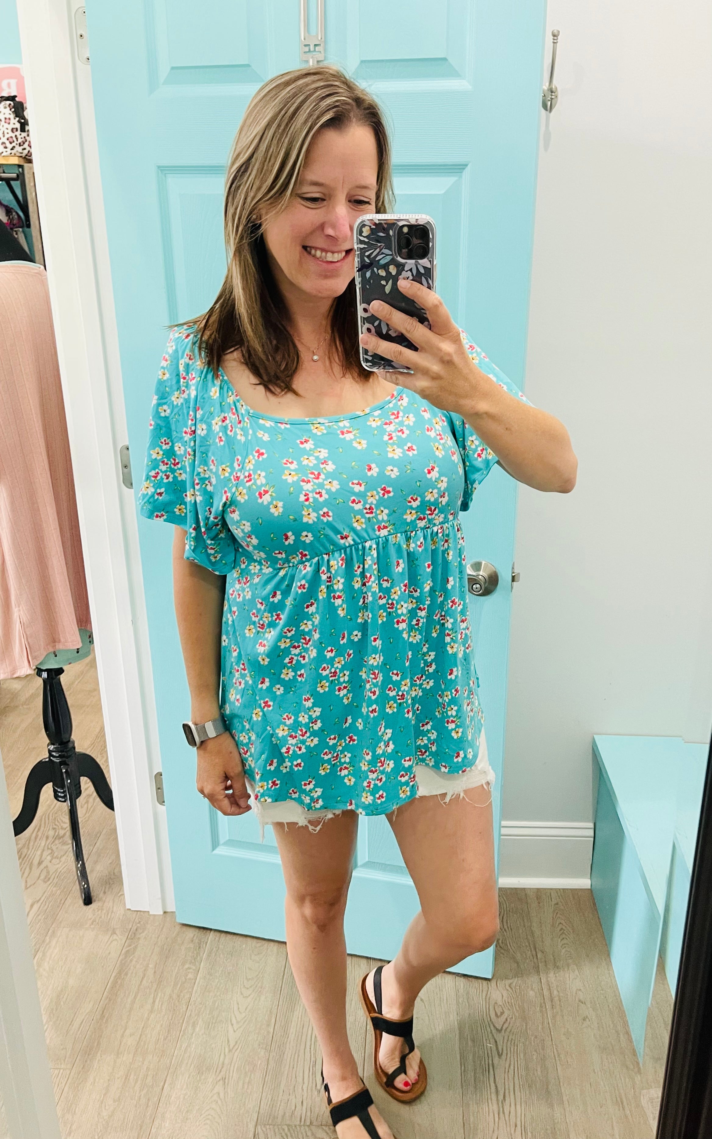 Teal green floral top